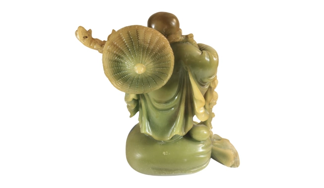 Photo de la statue Bouddha rieur de dos