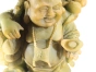 Photo de la statue Bouddha rieur en gros plan peinture ternis